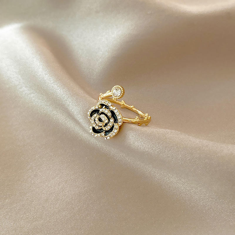 🔥 OFERTA EXCLUSIVA | Petal™ Anillo de circonita ajustable en oro rosa negro